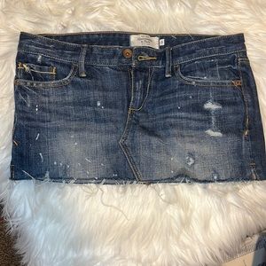 Abercrombie & Fitch Mini skirt with denim blue distressed fringes 🤍
